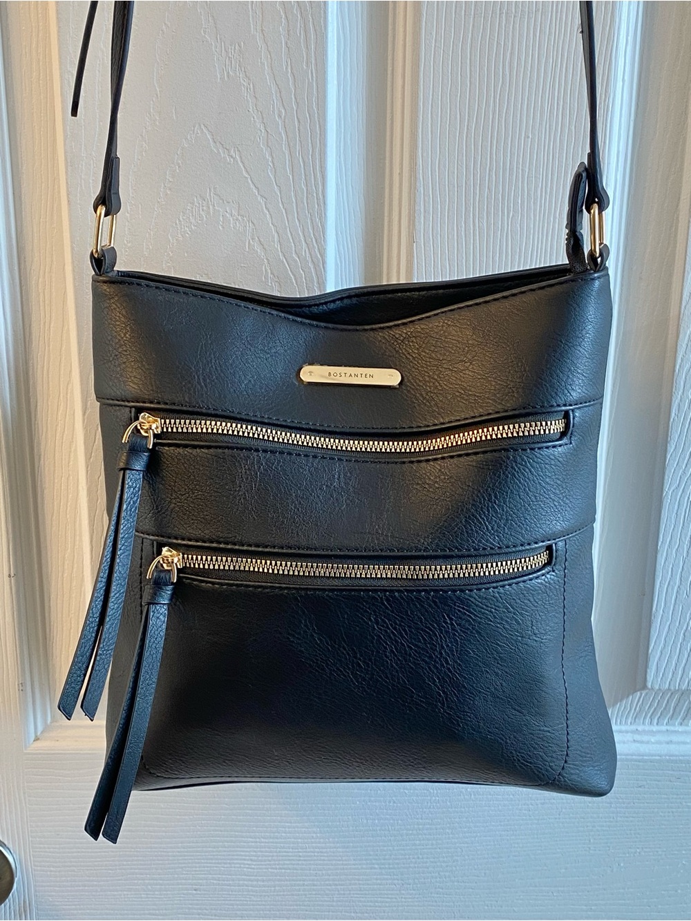 Bostanten Crossbody bag, excellent condition Looks New,many pockets clean bag.